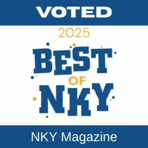 Travel essentials on a table with insurance documents, passports, hat, sunglasses, and starfish for vacation planning